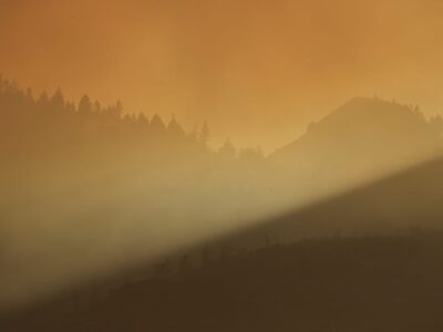 Sunlight cuts through smoke from the Pickett fire on Friday, Aug. 22, 2025, in Napa County, Calif. (AP Photo/Godofredo A. Vásquez)